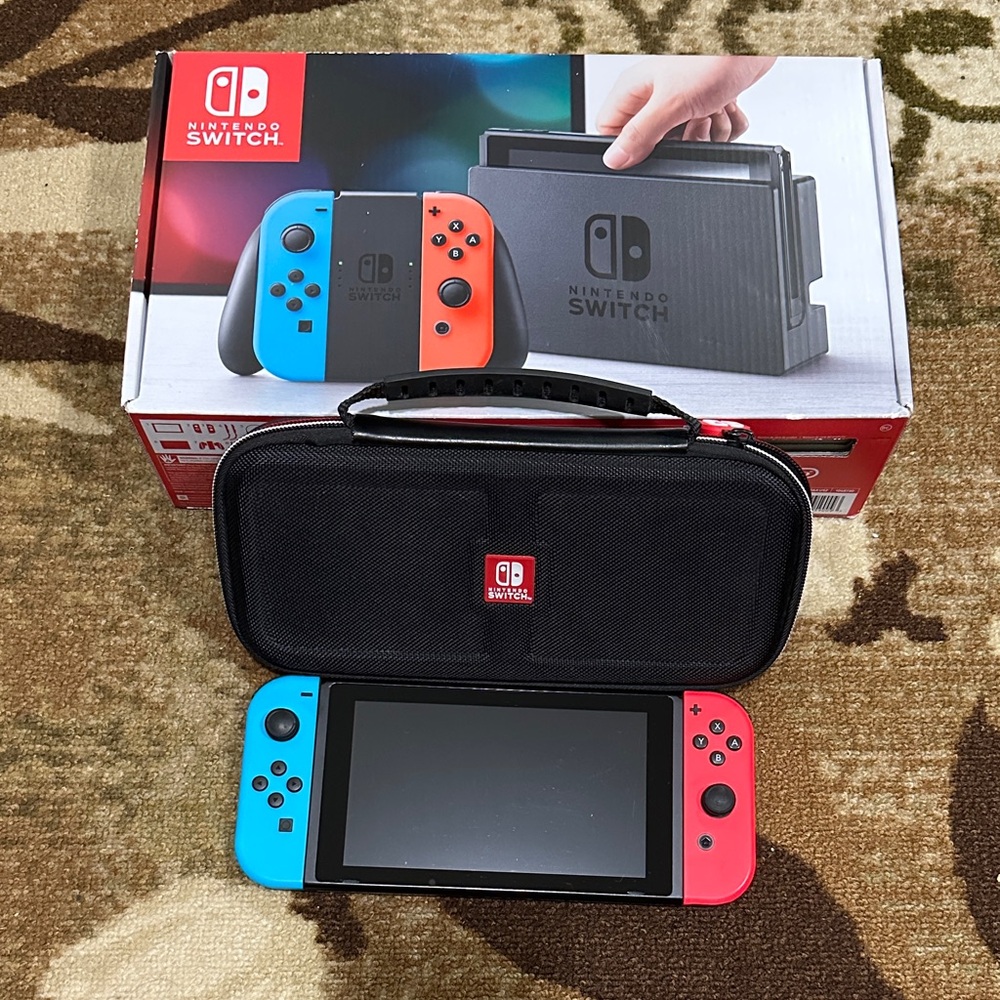 Nintendo Switch with Red and Blue Joy-Con Controllers